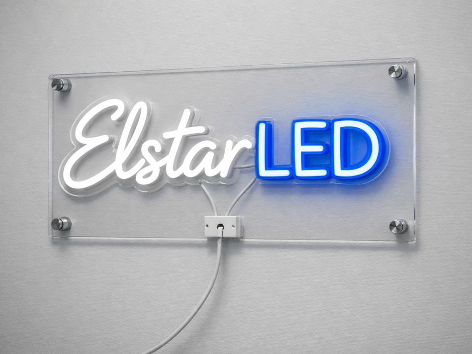 Finished DIY neon-style sign mounted on a clear acrylic backer with standoffs