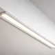 COB LED strip installed in an aluminum profile with an opal diffuser, forming a continuous line of light